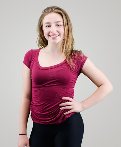 teenage girl with hand on hip